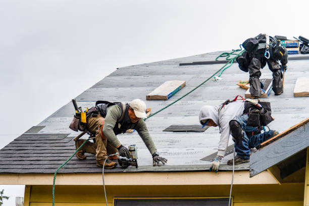 Professional Gutter Installation technician working in Mosier, OR
